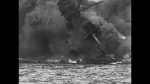 Pearl Harbor: NPC-1733 - Overturned and wrecked ships, others afire